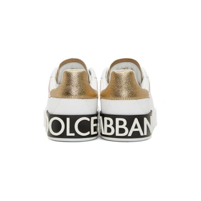 DOLCE AND GABBANA 白色和金色搭配的 PORTOFINO 徽标运动鞋