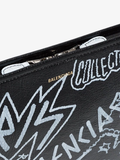 Shop Balenciaga 'bazar Grafitti' Clutch In Black