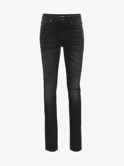 Shop Saint Laurent Ripped Skinny Jeans In Black