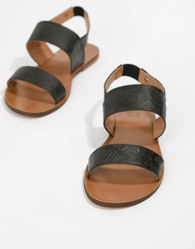 Shop Love Moschino Flat Sandals - Black