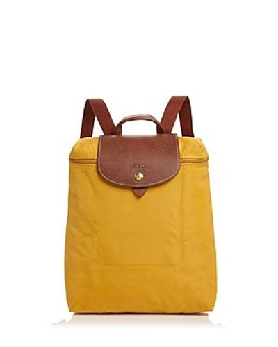Shop Longchamp Le Pliage Nylon Backpack In Sunshine Yellow/gold