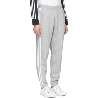 Shop Adidas Originals Grey 3 Stripe Lounge Pants In Medgreyheat