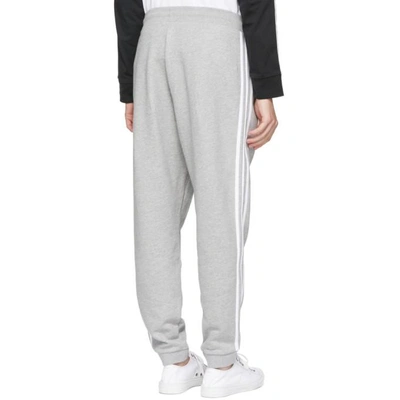Shop Adidas Originals Grey 3 Stripe Lounge Pants In Medgreyheat