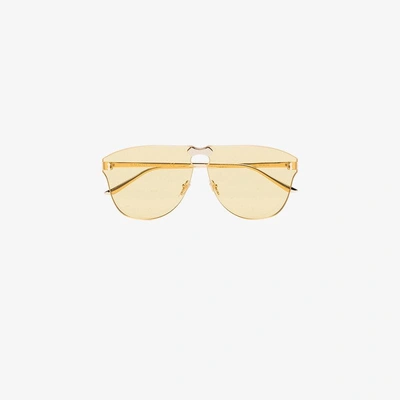 Shop Gucci Eyewear Rahmenlose Pilotenbrille In Yellow/orange