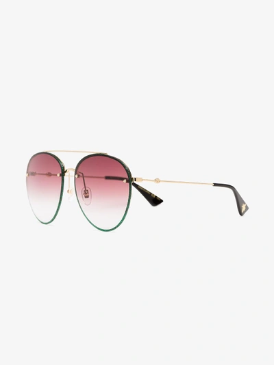 Shop Gucci Eyewear Pilotenbrille Im Metallic-look In Grey