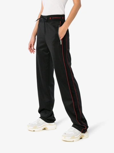 Shop Givenchy Side-stripe Logo Track Pants In Black