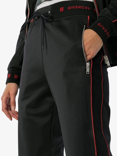 Shop Givenchy Side-stripe Logo Track Pants In Black