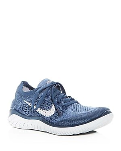Shop Nike Women's Free Rn Flyknit 2018 Lace Up Sneakers In Squadron Blue/pure Platinum