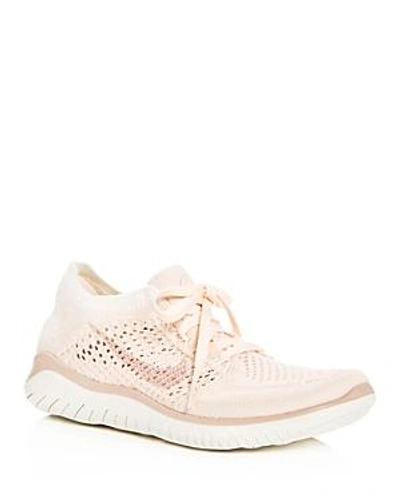 Shop Nike Women's Free Rn Flyknit 2018 Lace Up Sneakers In Guava Ice/particle Beige