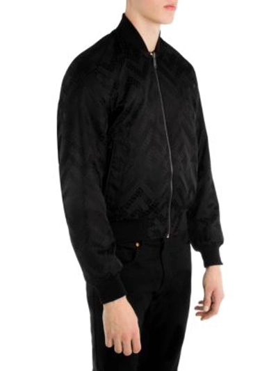 Shop Versace Reversible Baroque Bomber Jacket In Black