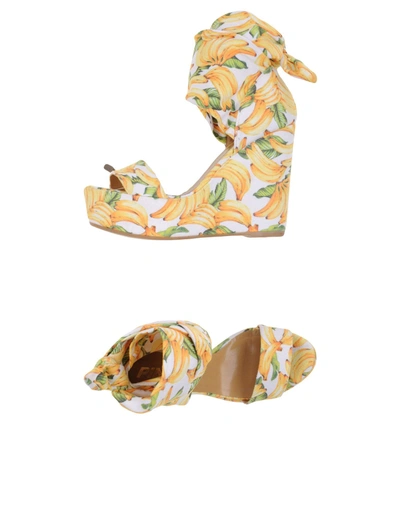 Shop Pin Up Stars Sandals In Yellow
