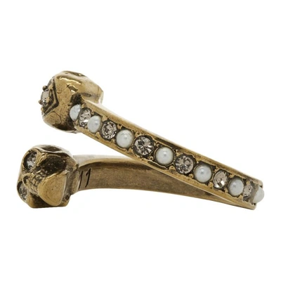 Shop Alexander Mcqueen Gold Twin Skull Ring In 7124 - 0448