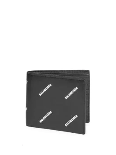 Shop Balenciaga All Over Logo Print Wallet In Black Natural