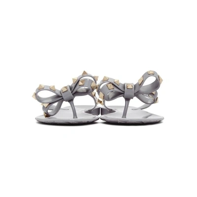 Orphan Undvigende Tremble Valentino Garavani Valentino Grey Rockstud Jelly Bow Sandals In Pr6 Past Gr  | ModeSens
