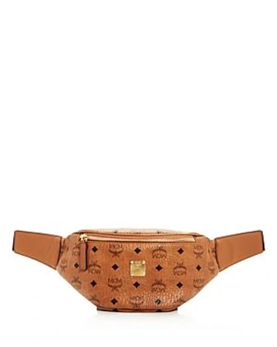 Shop Mcm Stark Small Belt Bag In Cognac Brown/gold