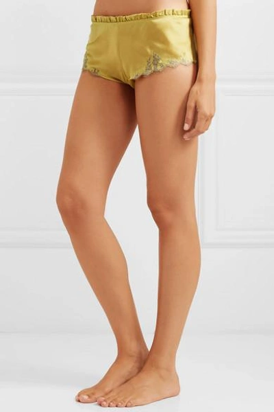 Shop Carine Gilson Flottant Chantilly Lace-trimmed Silk-satin Shorts In Mustard