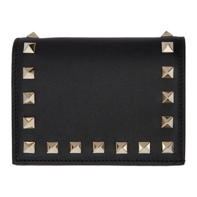 Shop Valentino Black  Garavani Small Rockstud French Flap Wallet In 0no Black