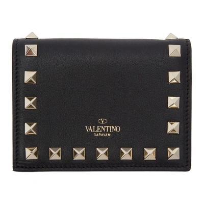 Shop Valentino Black  Garavani Small Rockstud French Flap Wallet In 0no Black