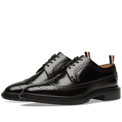 Shop Thom Browne Classic Rubber Sole Long Wing Brogue In Black