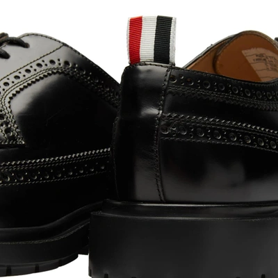 Shop Thom Browne Classic Rubber Sole Long Wing Brogue In Black