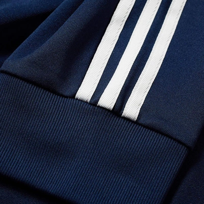 Shop Adidas Originals Adidas Superstar Track Pant In Blue