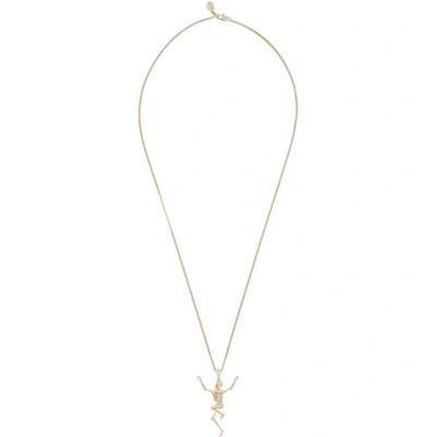 Shop Alexander Mcqueen Gold Dancing Skeleton Necklace In 0953 Gold