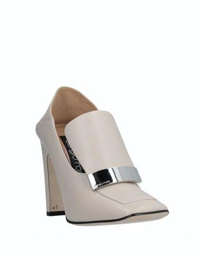 Shop Sergio Rossi Loafers In Beige