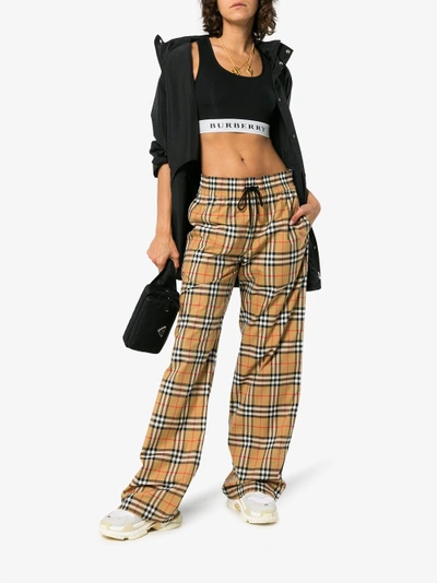 Shop Burberry Vintage Check Drawcord Trousers In Yellow&orange
