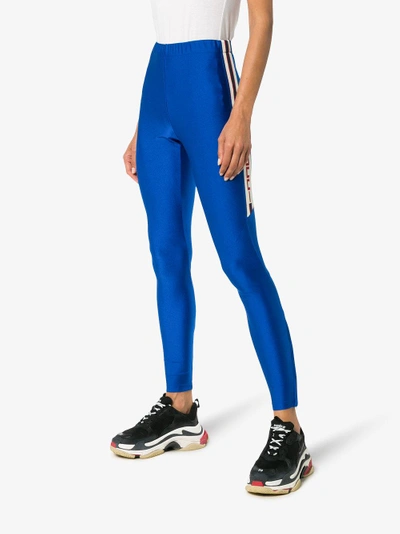 Shop Gucci Logo Side Stripe Leggings In Blue