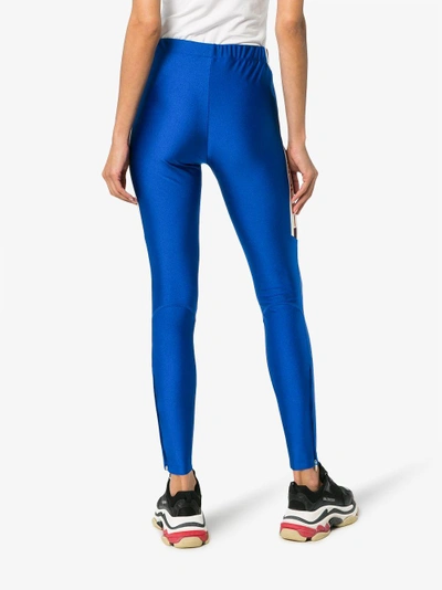Shop Gucci Logo Side Stripe Leggings In Blue