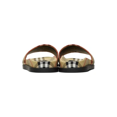 Shop Burberry Yellow Ashmore Slides In Antylw