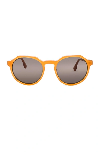 Shop Le Specs Bang! In Orange