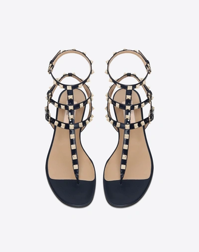 Shop Valentino Patent Rockstud Flat Sandal In Dark Blue