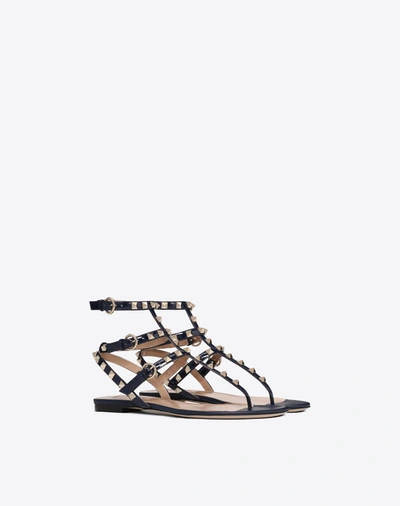 Shop Valentino Patent Rockstud Flat Sandal In Dark Blue