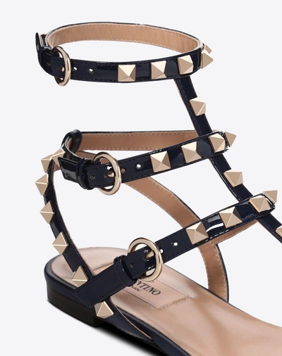 Shop Valentino Patent Rockstud Flat Sandal In Dark Blue