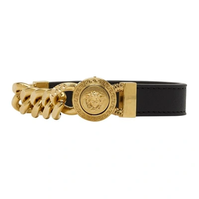 Shop Versace Black And Gold Leather Medusa Bracelet In K41t Black