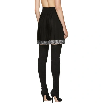 Shop Versace Black Pleated Logo Band Skirt In A1008 Black