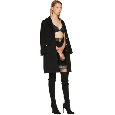 Shop Versace Black Pleated Logo Band Skirt In A1008 Black