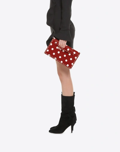 Shop Valentino Polka Dot Rockstud Wristlet Clutch In Red