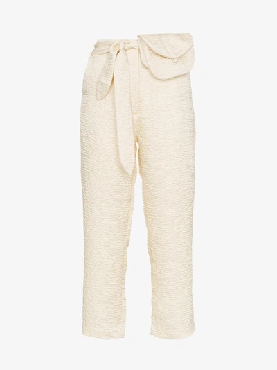 Shop Nanushka Raimo Belted Cropped Judo Trousers In Nude/neutrals