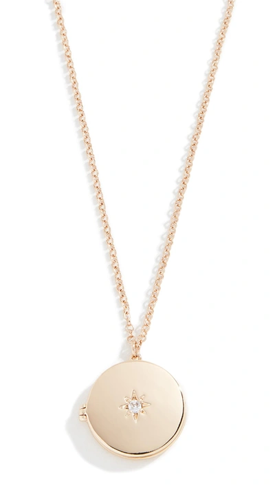 Shop Shashi Starburst Locket Necklace In Yellow Gold