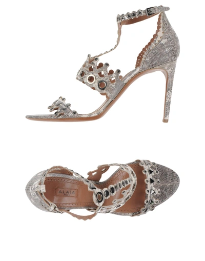 Shop Alaïa Sandals In Grey