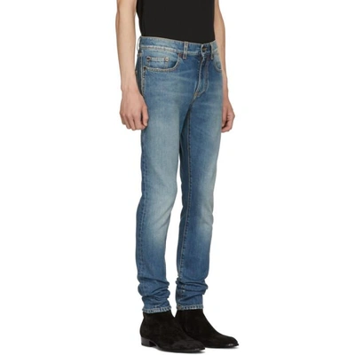 Shop Saint Laurent Blue 70s Low-rise Skinny Jeans In 4621 Blue