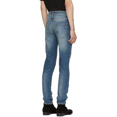 Shop Saint Laurent Blue 70s Low-rise Skinny Jeans In 4621 Blue