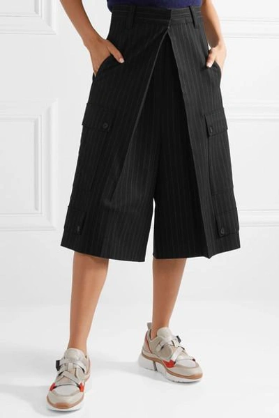 Shop Jw Anderson Pinstriped Wool-blend Culottes In Black