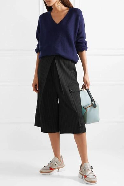 Shop Jw Anderson Pinstriped Wool-blend Culottes In Black