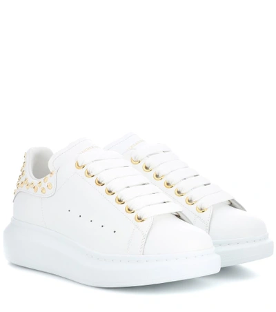 Shop Alexander Mcqueen Studded Leather Sneakers In White