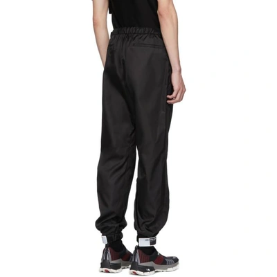 Shop Prada Black Nylon Gabardine Trousers In F0002 Nero
