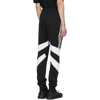 Shop Adidas Originals Black And White Palmeston Lounge Pants In Black/white