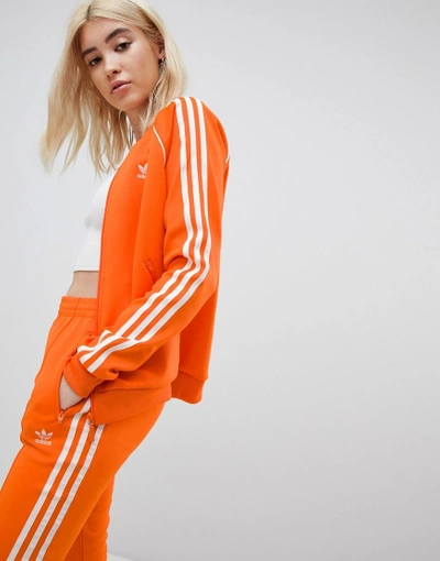 Adidas originals orange tracksuit new arrivals